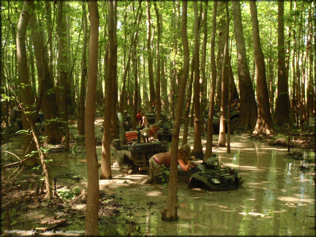 OHV traversing the water at ATV Mud Fury Trail