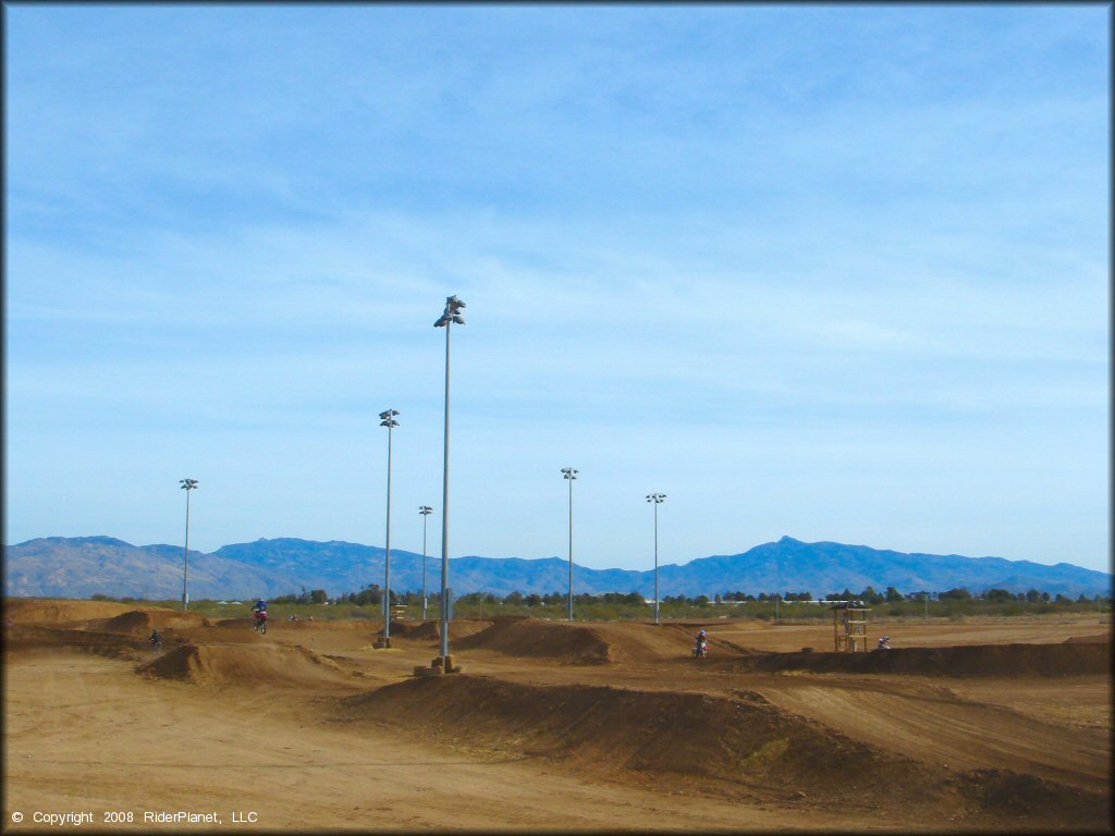 Dirt Bike catching some air at M.C. Motorsports Park Track