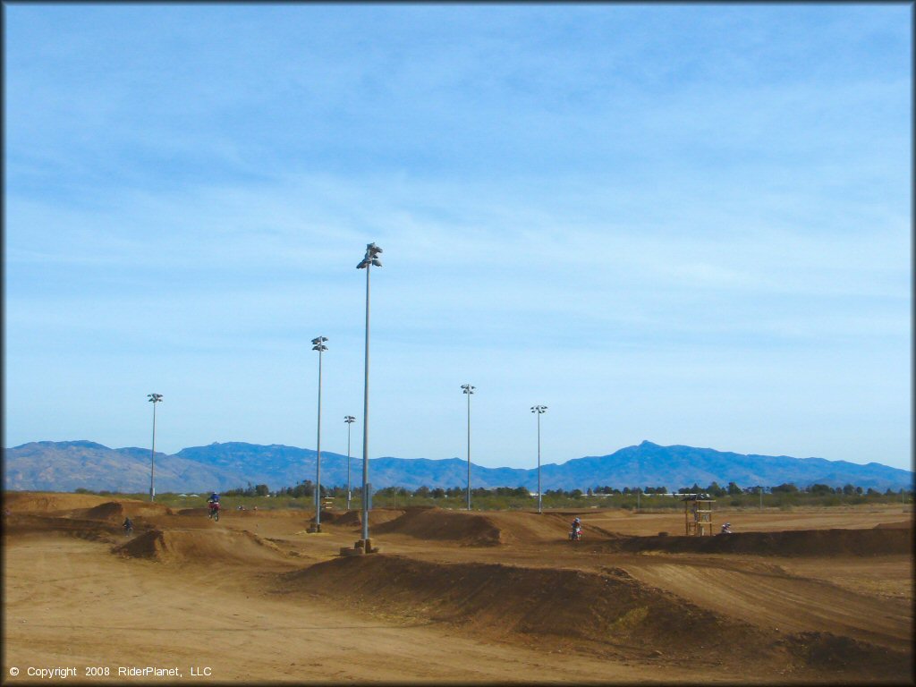 Motorcycle jumping at M.C. Motorsports Park Track