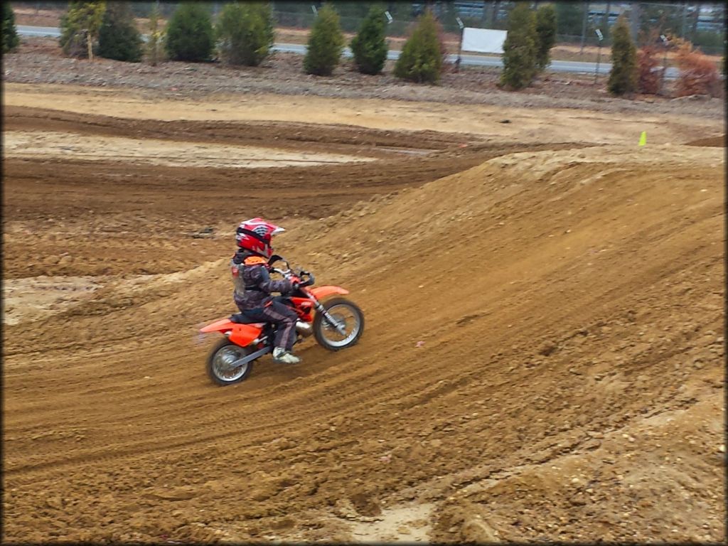 Young boy on KTM 50cc.